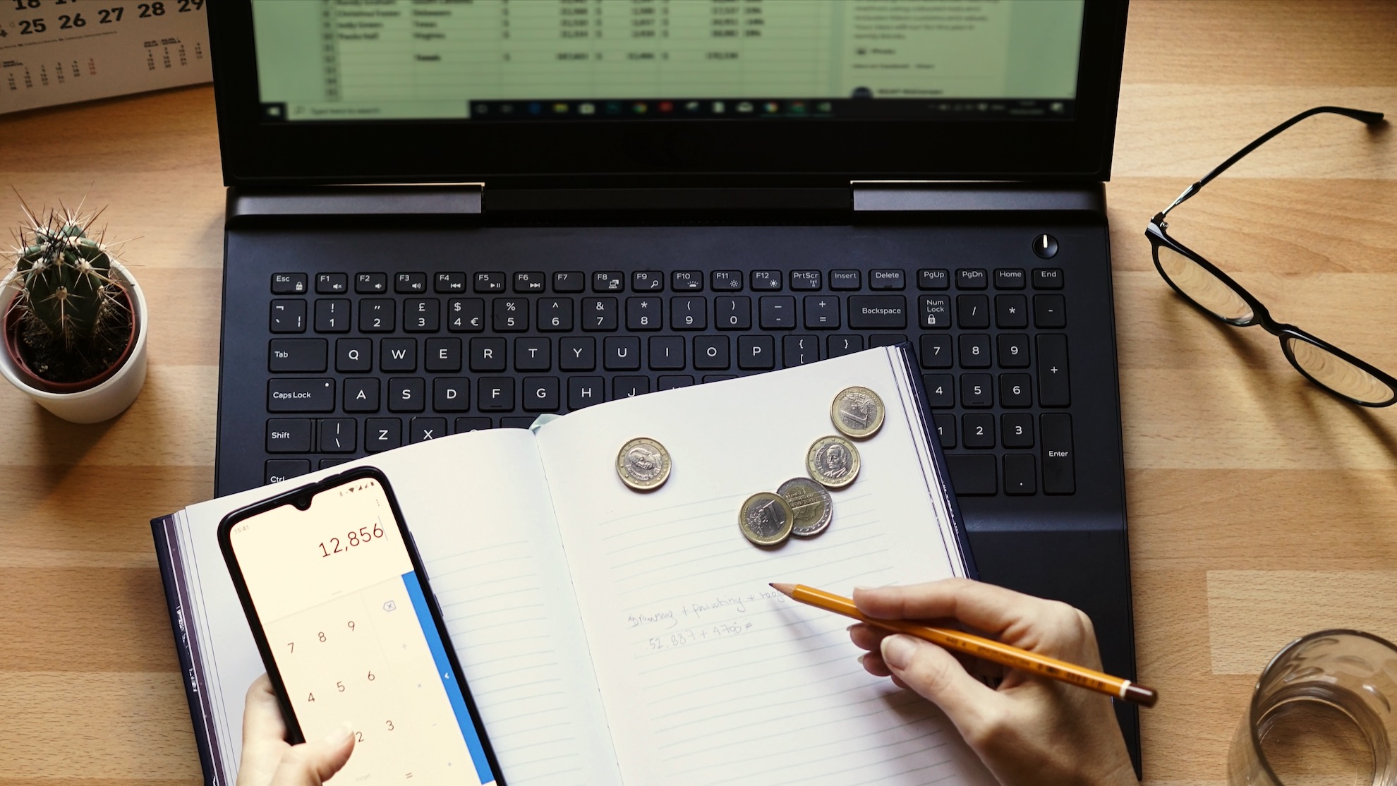 closeup shot of an entrepreneur working from home on his personal finances and savings